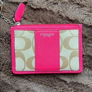 Small pink trim coach signature pattern coin purse